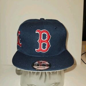 Boston Red Sox New Era Navy Blue Snapback Cap with Red Logo